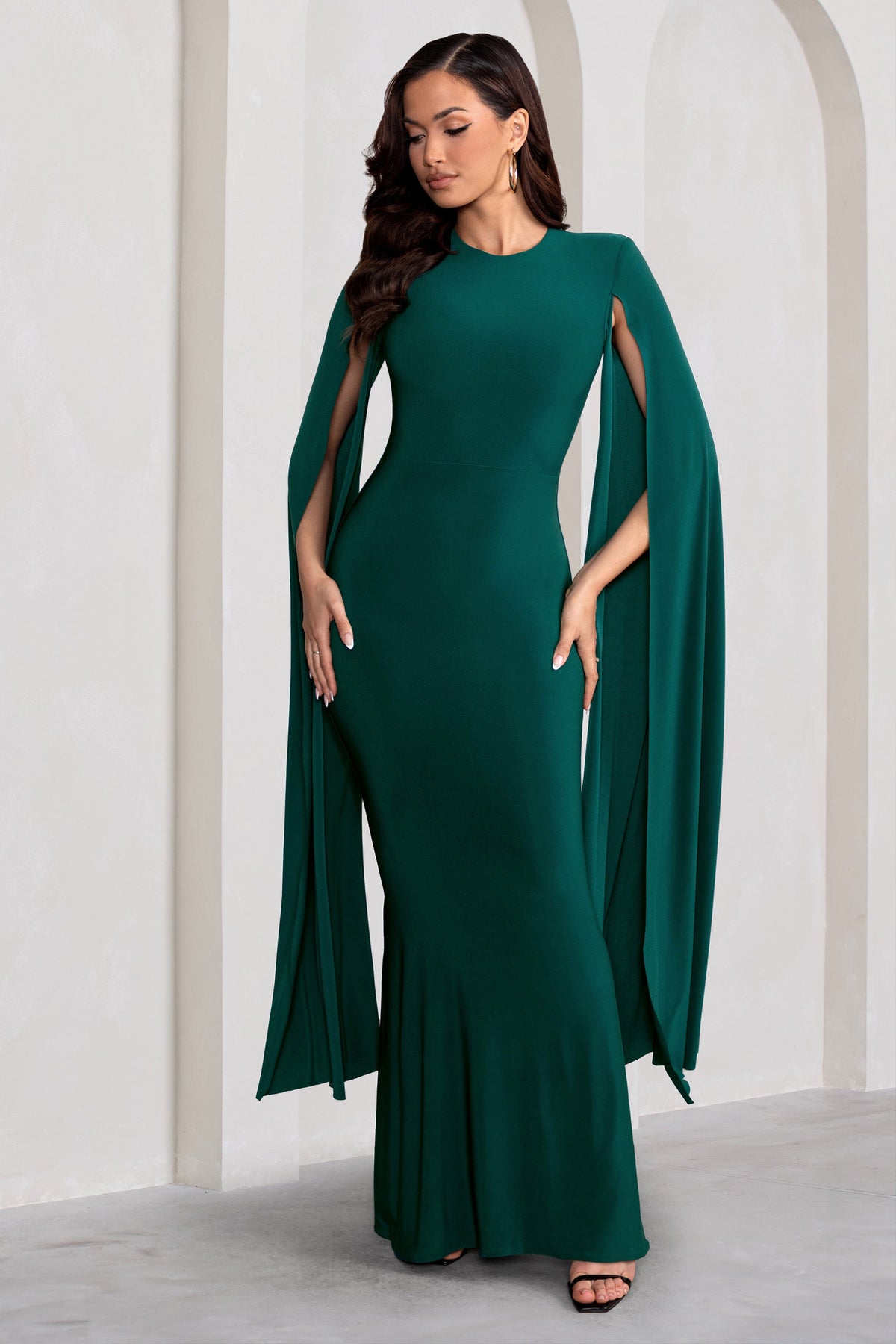 Green dress shop with cape