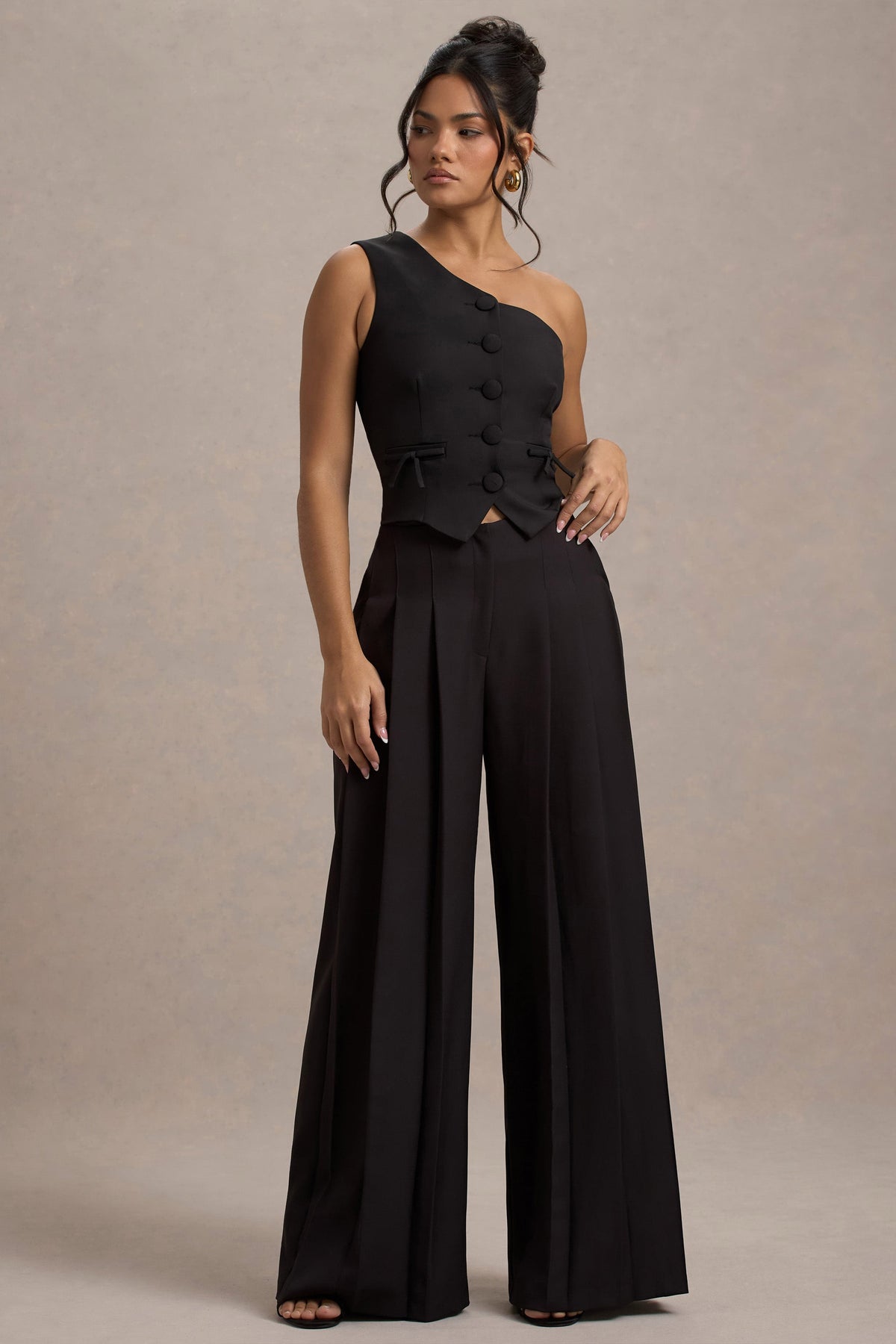 WB_HR_CL134935002-LeliaBlackOneShoulderTailoredTopWithBows_HR_CL134879002-GalileaBlackPlisseWide-LegTrousers1_142b7441-a08a-4cbb-8571-b8bfd5e86ec4
