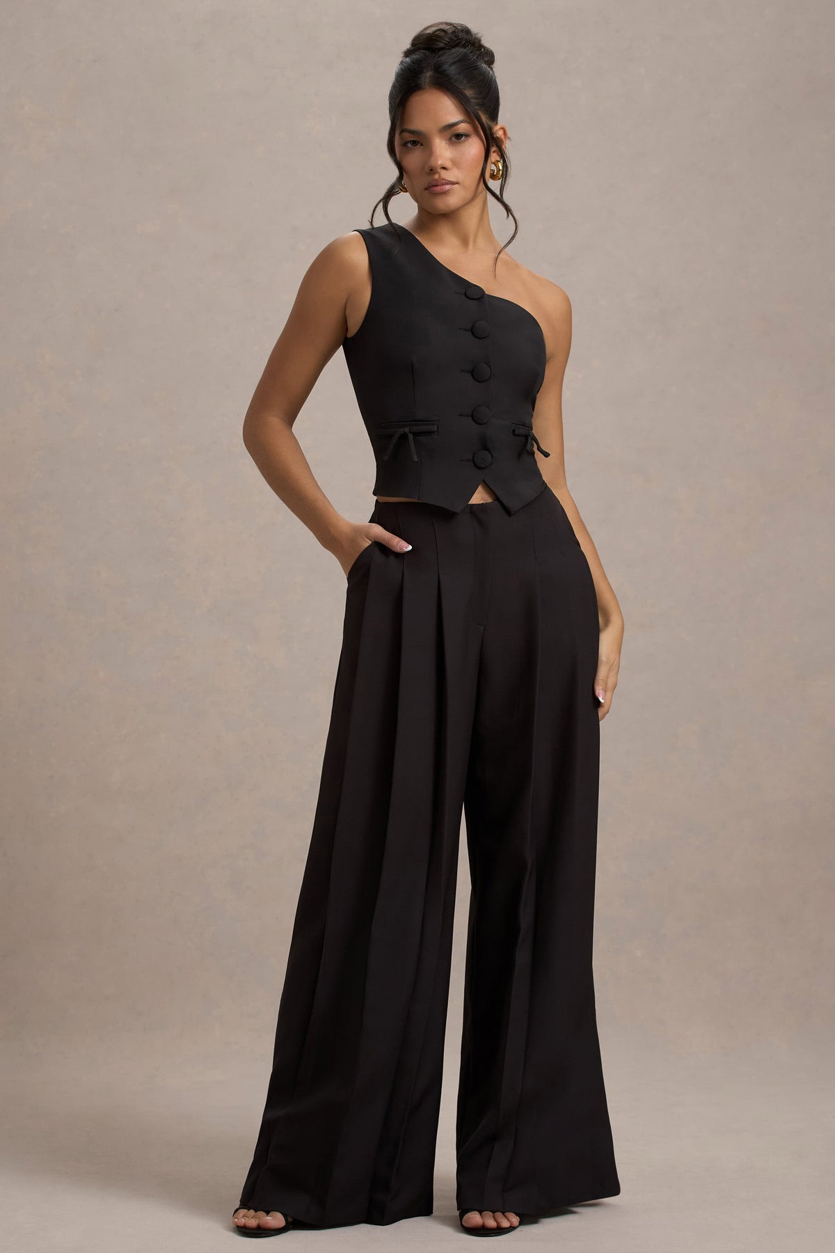 WB_HR_CL134935002-LeliaBlackOneShoulderTailoredTopWithBows_HR_CL134879002-GalileaBlackPlisseWide-LegTrousers4_70f97a74-68a5-4f8f-82c5-48f248d5340e